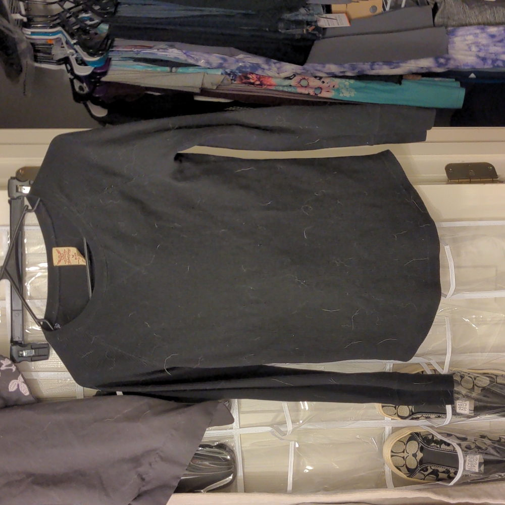 Brand New condition, black waffle shirt. Long sleeve.